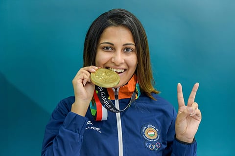 Bronze medallist India's Heena Sidhu poses during the awards ceremony for 10m air pistol women's final at the 18th Asian Games in Palembang. (Photo | AP)