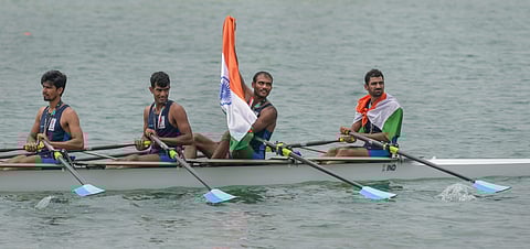 Indian rowing Men's team members Sawarn Singh Bhokanal Dattu Om Prakash and S Singh Quadruple Sculls celebrate after the medal ceremony winning the gold medal during the 18th Asian Games Jakarta Palembang 2018. (Photo | PTI)