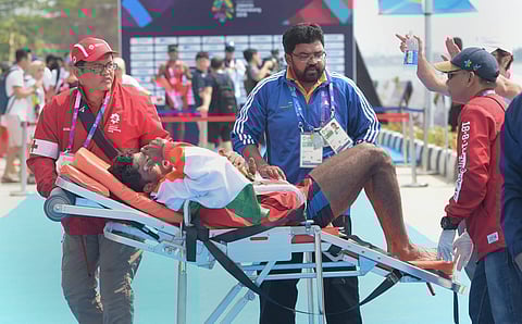 Bronze medal winner Indian rower Dushyant being taken for medical help after feeling uneasyness during the medal ceremony for the Lightweight Men's Single Sculls LM1x at the 18th Asian Games Jakarta Palembang 2018 in Indonesia. (Photo | PTI)