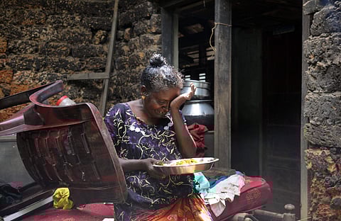 A woman, whose house was washed away in the floods, breaks down upon learning that her valuables kept in a neighbour’s house were also swallowed up by the raging waters of Periyar in Nedumbassery. (Photo | A Sanesh/EPS)