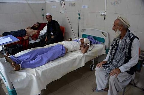 Afghan victims receive treatment at a hospital following a suicide attack in Jalalabad on August 25, 2018. (Photo | AFP)