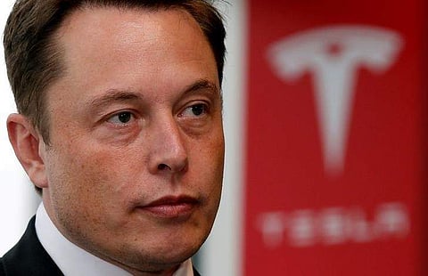Tesla Motors Inc Chief Executive Elon Musk pauses during a news conference in Tokyo. (Photo: Rueters)