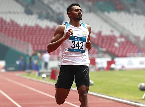 India's Muhammed Anas Yahiya crosses the finish line to win his men's 400m heat during the athletics competition at the 18th Asian Games in Jakarta, Indonesia, Saturday, Aug. 25, 2018. | AP