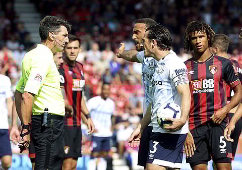 Everton's Richarlison second right background, reacts after being sent off by referee Lee Probert, left, during the English Premier League match against Bournemouth | AP