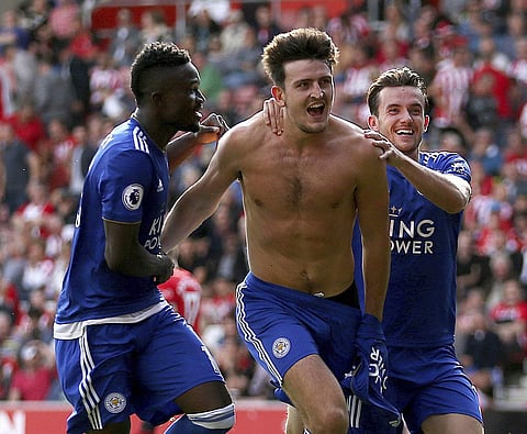 Leicester City's Harry Maguire, centre, celebrates with teammates after scoring his side's second goal of the game against Southampton | AP