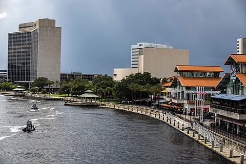 Law enforcement patrols the St. Johns River by boat just outside the Jacksonville Landing where an active shooter was reported Sunday | ap