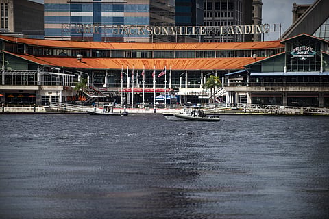 Law enforcement patrols the St. Johns River by boat just outside the Jacksonville Landing where an active shooter was reported Sunday, Aug. 26, 2018 in Jacksonville. (Photo | AP)
