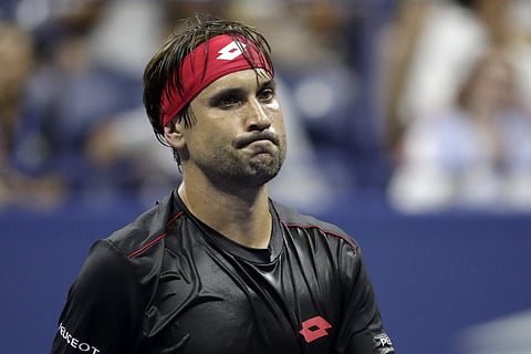 David Ferrer reacts after losing a point to Rafael Nadal during the first round of the US Open tennis tournament. | AP