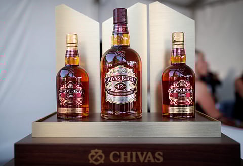 Bottles of Chivas Regal blended Scotch whisky, produced by Pernod Ricard SA, are displayed on the campus of the HEC School of Management in Jouy-en-Josas, near Paris. (Photo: Reuters)