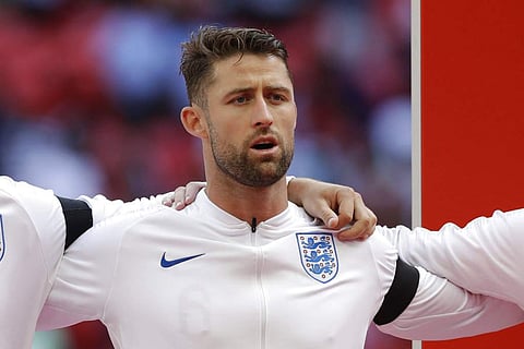 FILE - In this Saturday, June 2, 2018 file photo, England's Gary Cahill stands for the anthems before the international friendly soccer match between England and Nigeria at Wembley stadium in London. (Photo | AP)