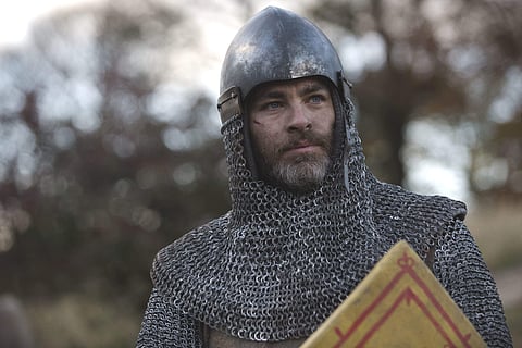 This image released by Netflix shows Chris Pine in a scene from David Mackenzie’s Robert the Bruce epic “Outlaw King,' premiering on Nov. 9. (David Eustace/Netflix via AP)