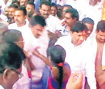 Choppadandi MLA Bodige Shobha pushing Gaddam Chokka Reddy in Karimnagar on Tuesday | Express