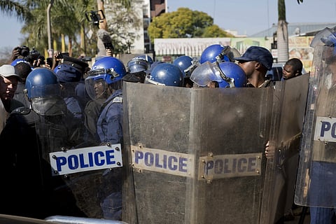 Emmerson Mnangagwa was declared the winner of a tight election, riot police disrupted a press conference where opposition leader Nelson Chamisa was about to respond to the election results. (Photo | AP)