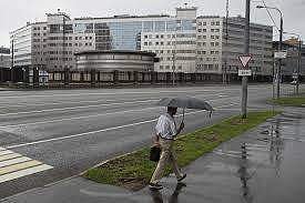 A man walks past the building of the Russian military intelligence service in Moscow, Russia. (Photo | AP)