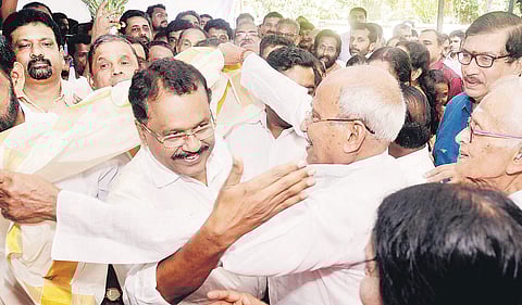 O Rajagopal MLA draping a ponnada on P S Sreedharan Pillai, who took charge as the BJP state president, at the party’s state office in Thiruvananthapuram on Thursday | Vincent pulickal