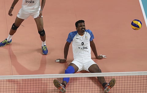 Deepest Sinha of India reacts as he plays against Pakistan during their men volleyball match at the 18th Asian Games in Jakarta, Indonesia, Tuesday, Aug. 28, 2018. | AP