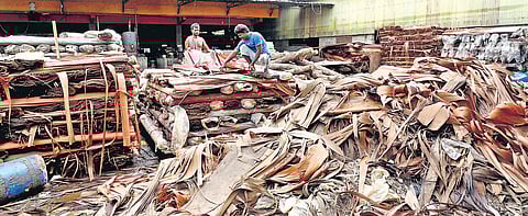 Raw materials for making plywood piled up at a factory which was inundated during the flood at Kandanthara near Perumbavoor | Melton Antony