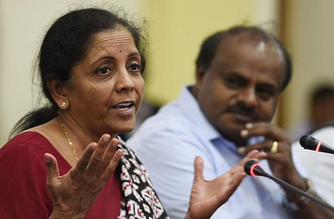 Defence Minister Nirmala Sitharaman along with Karnataka Chief Minister Kumaraswamy addressing the media in Vidhan Soudha, in Bengaluru on August 4, 2018. (Photo | Vinod Kumar T/EPS)