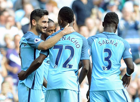 Manchester City's Ilkay Gundogan, left, celebrates with teammates after scoring during the English Premier League soccer match between Manchester City and Bournemouth at the Etihad Stadium in Manchester, England. | (File | AP)