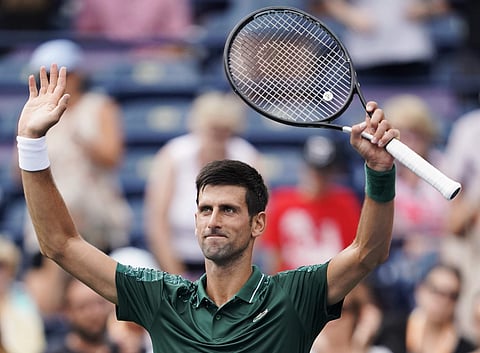 Novak Djokovic, of Serbia, celebrates defeating Peter Polansky, of Canada, at the Rogers Cup men's tennis tournament in Toronto, Wednesday, Aug. 8, 2018. (Photo | AP)