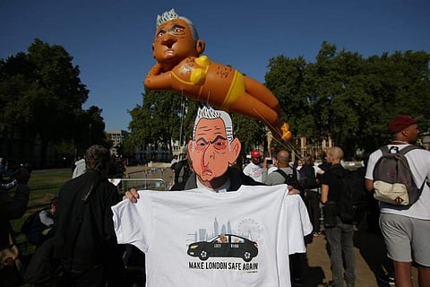 Critics of London Mayor Sadiq Khan launched over Westminster on September 1, 2018, a large balloon depicting him in a yellow bikini, after he permitted a giant 'Baby Trump' balloon to fly there in July. (Photo | AFP)