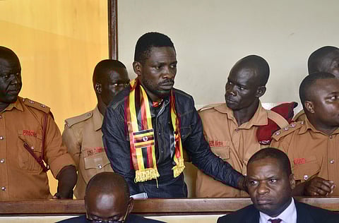 Bobi Wine, whose real name is Kyagulanyi Ssentamu, departed Entebbe International Airport on a KLM flight near midnight after authorities said they had given him the necessary clearance, (Photo | AP)