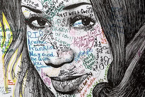 Well wishers leave hand written notes on boards outside the Charles H. Wright Museum of African American History during a public visitation for Aretha Franklin in Detroit, Wednesday, Aug. 29, 2018. | AP