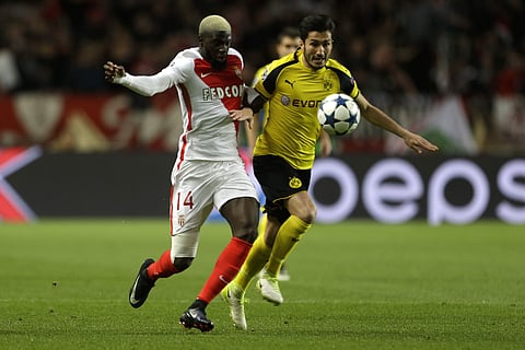 Monaco's Tiemoue Bakayoko, left, challenges for the ball with Dortmund's Nuri Sahin during the Champions League quarterfinal second leg soccer match at the Louis II stadium. | (File | AP)