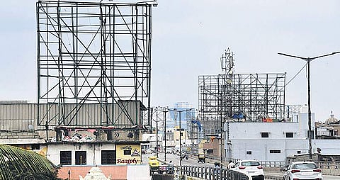 Though flex banners have been taken down, the metal and wooden frames are still up. Residents say this is spoiling the city’s beauty.