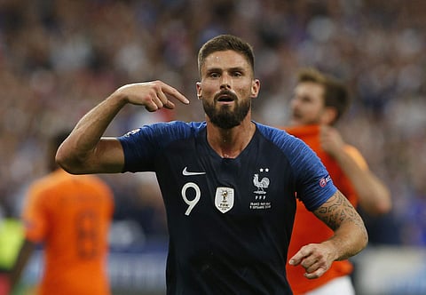 Olivier Giroud of France.left, celebrates with teammates after scoring his sides 2nd goal during the UEFA Nations League soccer match between France and the Netherlands at the Stade De France in Paris, Sunday, Sept. 9, 2018. | AP