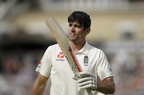 England's Alastair Cook, in his last ever batting innings before retiring from test cricket, walks off the field of play after losing his wicket from the bowling of India's Hanuma Vihari for 147 runs during the fifth Test match of a five match series betw
