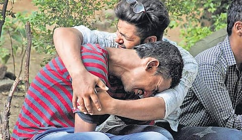 The family members of auto driver Hameed weeping outside the mortuary of Osmania Hospital in Hyderabad on Monday. (inset) the deceased (from left to right) Abdul Hameed, Dasarath and Janardhan Shivaji | Sathya keerthi