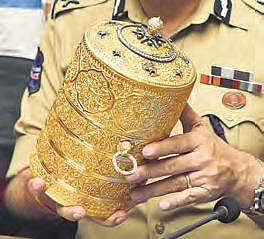 The golden tiffin box retrieved from the burglars |  R Satish Babu