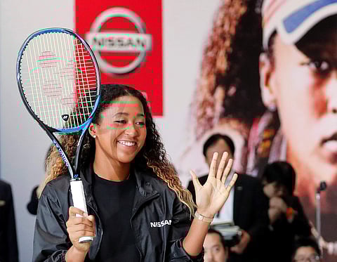 U.S. Open tennis champion Naomi Osaka attends a contract signing ceremony at Nissan's global headquarters in Yokohama, Japan
