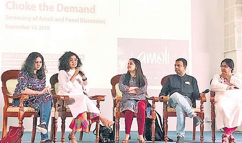 Actor Parvathy addresses the audience at a panel discussion post the screening of Amoli at Christ University recently