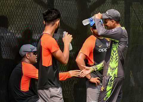 Former Indian cricket team captain Mahendra Singh Dhoni meets Pakistani cricketer Shoaib during net practice ahead of Asia Cup cricket in Dubai Friday Sept 14 2018. | PTI