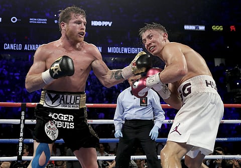 Canelo Alvarez lands a punch against Gennady Golovkin in the 12th round during a middleweight title boxing match in Las Vegas. | AP