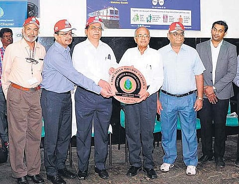 Southern Railway General Manager R K Kulshrestha and Chennai DRM Naveen Gulati being presented the IGBC award by C N Raghavendran, Chairman, IGBC-Chennai Chapter at Central railway station in the city on Saturday | Express