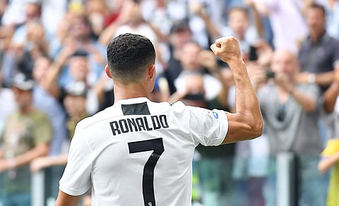 Five-time Ballon d'Or winner Cristiano Ronaldo, who arrived at Juventus amid great pomp and ceremony following a USD 117 million deal from Real Madrid, had not opened his account for the Serie A giants in three appearances. However, in Sunday's Serie A clash against Sassuolo, Ronaldo showed why he is among the greats of the game. (Photo | AP)
