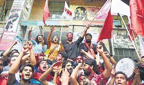 (From left at the back) Amutha Jayadeep (joint secretary), Sarika Chaudhary (vice-president) Aejaz Ahmed Rather (general secretary) and N. Sai Balaji (president) celebrate their victory in JNUSU polls with supporters | Parveen negi
