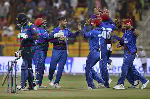 Afghanistan's Rashid Khan celebrates with teammates the dismissal of Sri Lanka's Shehan Jayasuriya during the Asia Cup clash | AP
