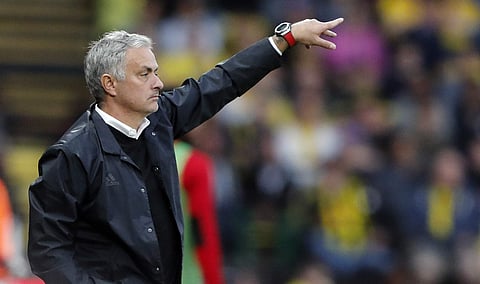 Manchester United head coach Jose Mourinho gestures during the English Premier League soccer match between Watford and Manchester United at Vicarage Road stadium in Watford, England, Saturday, Sept. 15, 2018. | AP