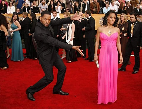 Will Smith with wife Jada Pinkett Smith at an award function. (Photo: AP)