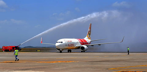 Kannur An Air India trial flight being accorded water salute after its successful landing at Kannur International Airport. (Photo| PTI)