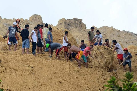 Rescuers on Cebu pulled 22 bodies from the rubble within 24 hours of the latest disaster, provincial disaster office spokesman Julius Regner said. (Photo | AFP)