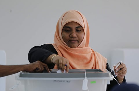 A woman voting in the Maldive Elections, 2018. (Photo | AP)
