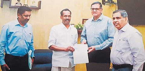 Ajit Thomas, chairman, and Gilbert D’Souza, chief officer, of A V Thomas Group of Companies handing over a cheque of I1 crore to the Chief Minister’s Distress Relief Fund, to Labour Minister T P Ramakrishnan