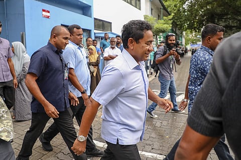 Yameen Abdul Gayoom leaves a polling station after casting his vote during presidential election day in Male, Maldives | AP