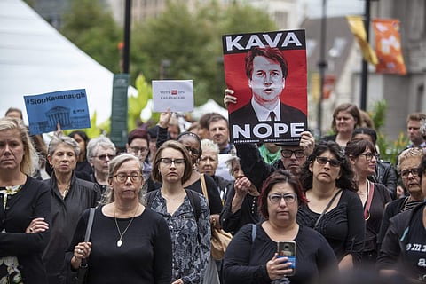 A crowd gathers at Dilworth Plaza by the city hall for a walkout in solidarity with Christine Blasey Ford, who accused Brett Kavanaugh of sexual assault, in Philadelphia on Monday, Sept. 24, 2018. (Photo | AP)