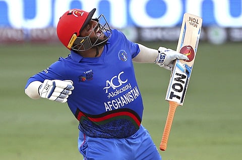 Opener Mohammad Shahzad had set up the game for Afghanistan with a whirlwind 124 off 116, the most significant hundred of his career, to take his team to 252 for eight. ( Photo | AP)